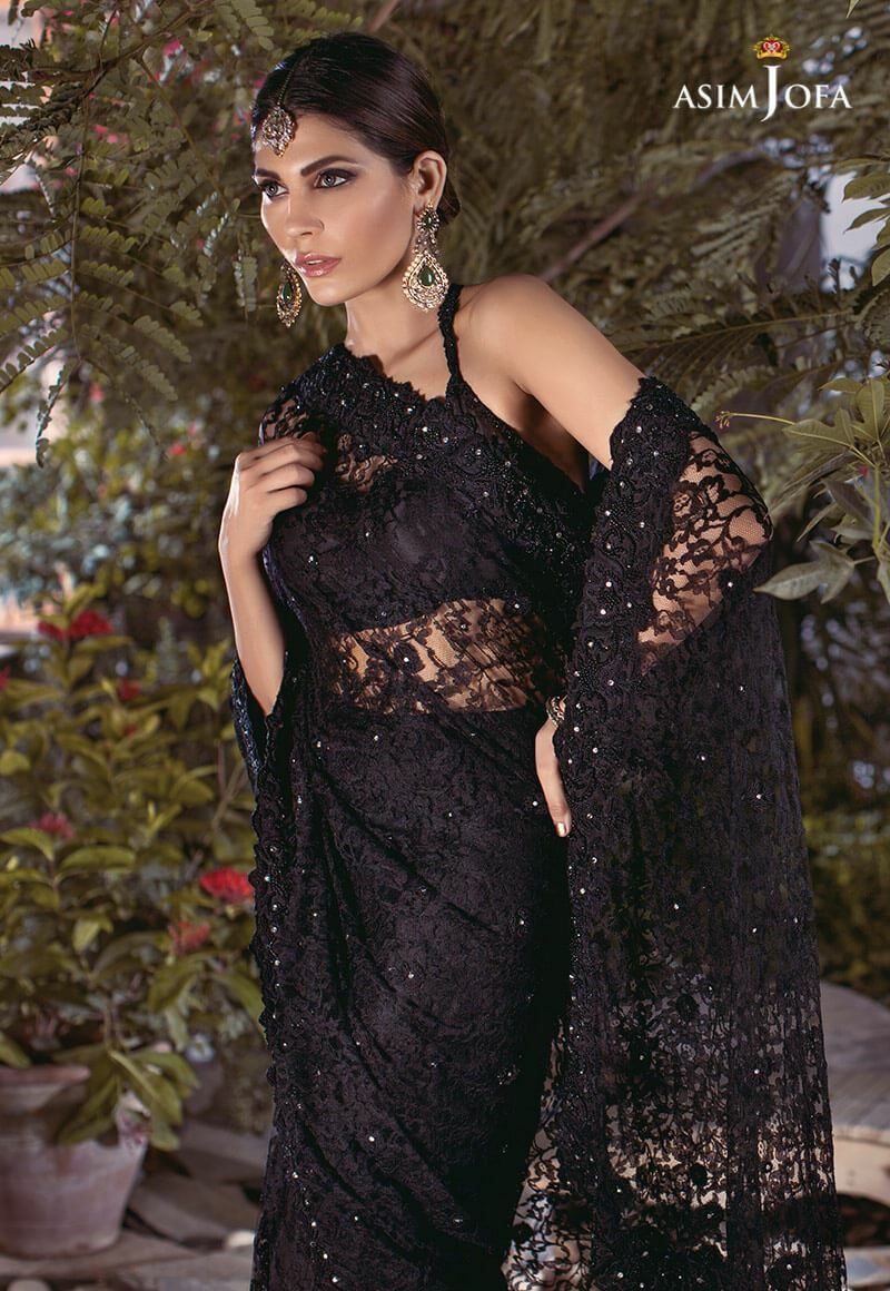 Asim Jofa - A classic black chantilly lace saree by Asim Jofa. View  details: http://www.asimjofa.com/aj-375 Black Chantilly lace saree with  heavy embellished embroidered borders with sequin spray sprinkled all over  the sari